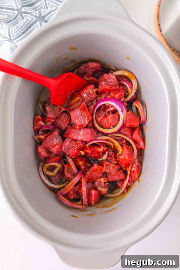 Beef teriyaki cooking in a slow cooker