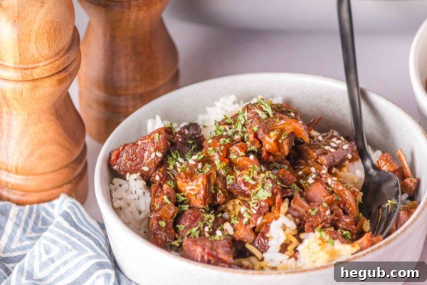 Leftover slow cooker beef teriyaki in a storage container