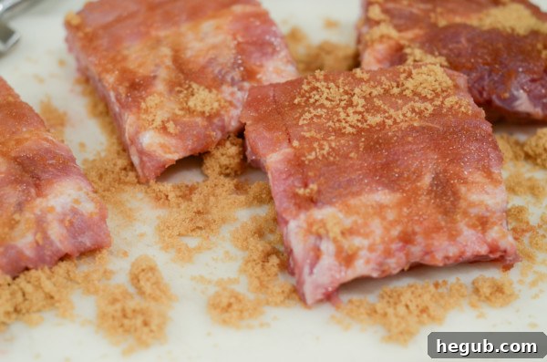 This image shows brown sugar on baby back ribs.