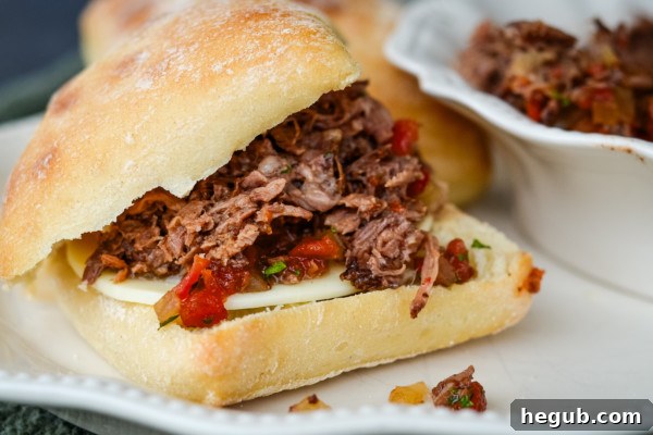 Effortless Slow Cooker Italian Roast 2 slow cooker italian roast on ciabatta bun